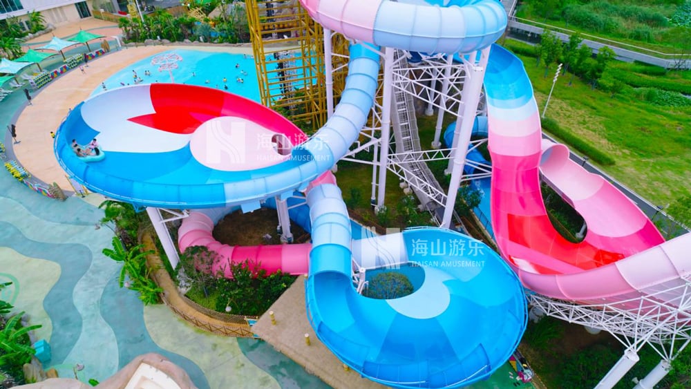 双重风暴，极致竞速——星际盘旋+巨浪翻滚组合引爆水乐园刺激体验